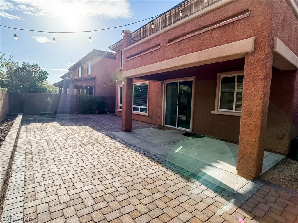 8683 Moreno Mountain Avenue Las Vegas, NV 89178 - Photo 22 of 26 A spacious backyard patio, perfect for outdoor entertaining and relaxation.