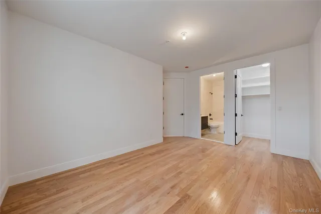a bathroom with a bathtub shower sink
