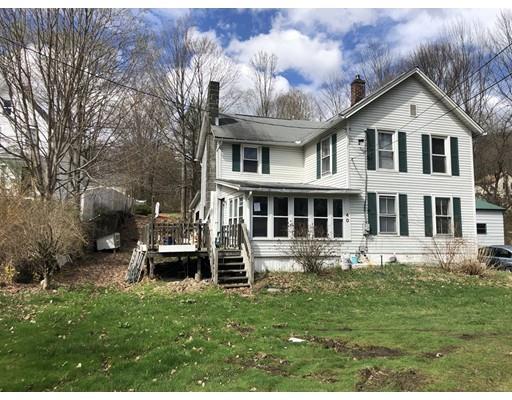 40 Middlefield Road Chester, MA 01011 - Photo 1 of 10 a front view of a house with a garden and trees