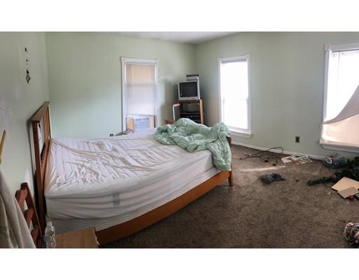 40 Middlefield Road Chester, MA 01011 - Photo 5 of 10 a bedroom with a bed and wooden floor