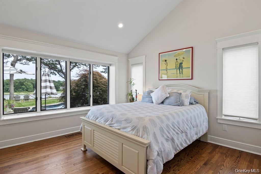 88 Dyke Road Setauket, NY 11733 - Photo 34 of 49 a bedroom with a bed and a large window