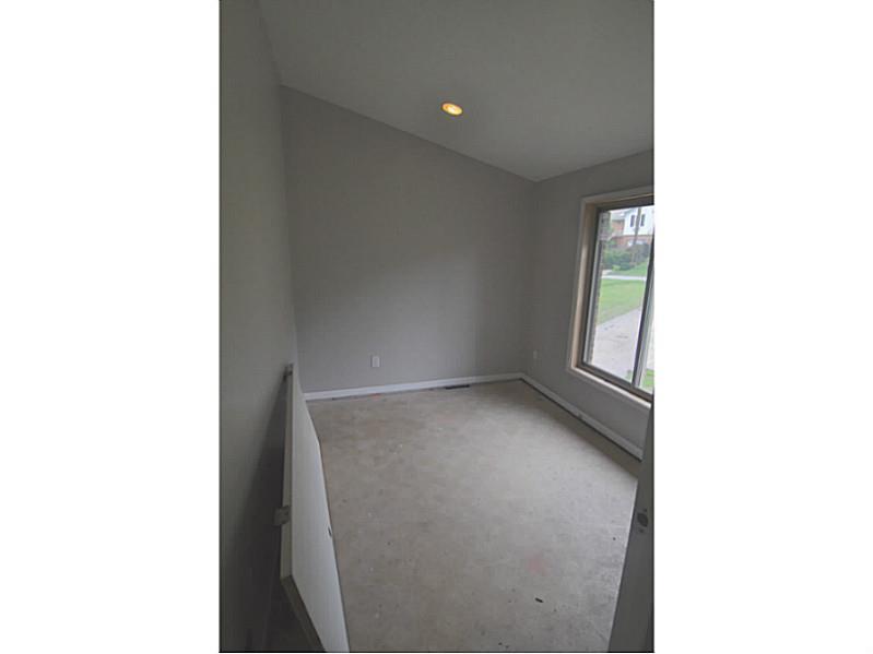 217 Tech Road Thornburg, PA 15205 - Photo 11 of 16 Executive Office/Suite. Office with large windows overlooking front of house off of great room
