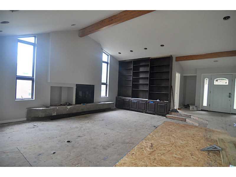 217 Tech Road Thornburg, PA 15205 - Photo 8 of 16 Great Room. Amazing built in matches dark hardwood color and beams will be painted to match.