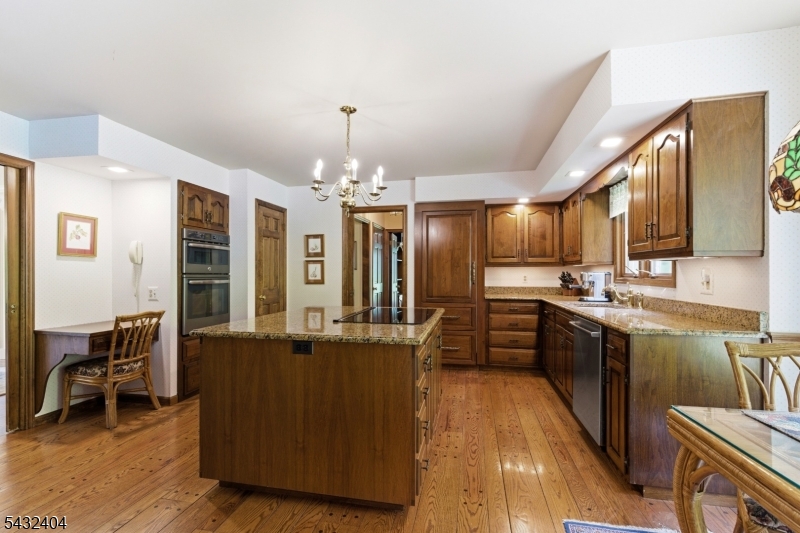 13 Hamden Road Flemington, NJ 08822 - Photo 11 of 37 a large kitchen with granite countertop a large counter top space appliances and cabinets