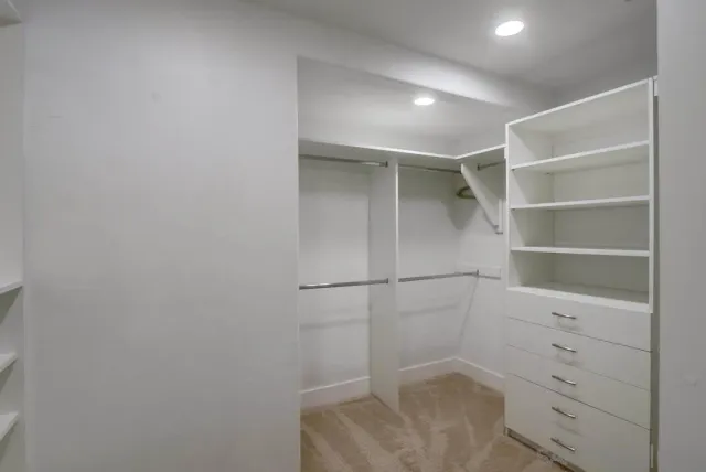 a view of a house with a yard porch and sitting area