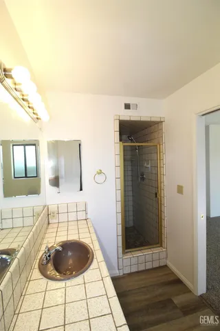 a living room with a table and chairs