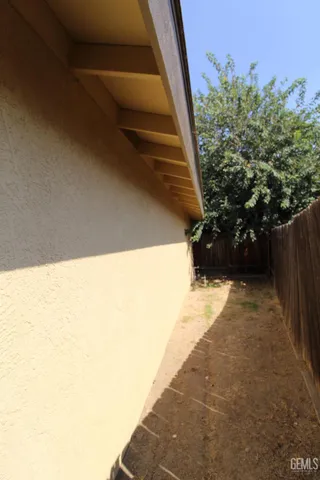 a view of balcony with wooden floor