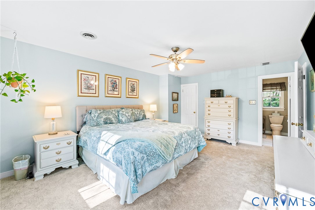 1013 Castle Hollow Road Midlothian, VA 23114 - Photo 23 of 45 Carpeted bedroom featuring a ceiling fan and conne
