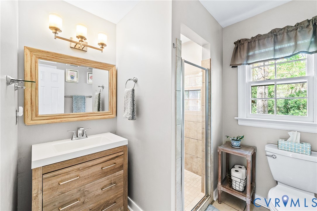 1013 Castle Hollow Road Midlothian, VA 23114 - Photo 25 of 45 Bathroom featuring a stall shower and vanity