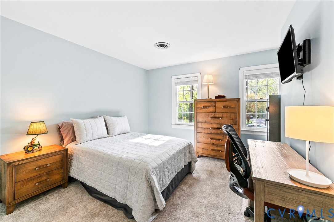 1013 Castle Hollow Road Midlothian, VA 23114 - Photo 29 of 45 Bedroom with light colored carpet and an office ar