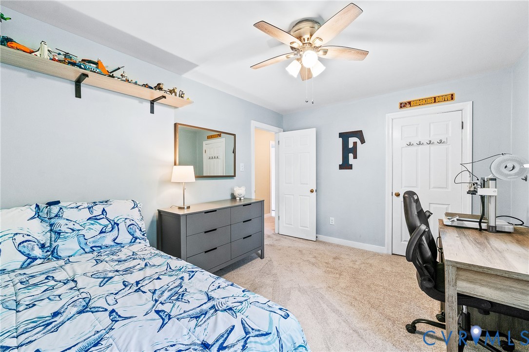 1013 Castle Hollow Road Midlothian, VA 23114 - Photo 31 of 45 Bedroom featuring light carpet, a desk, and a ceil