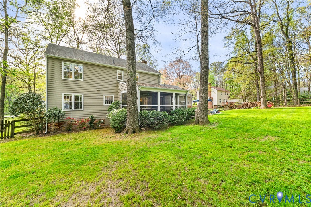 1013 Castle Hollow Road Midlothian, VA 23114 - Photo 40 of 45 Rear view of property featuring a sunroom and a ch