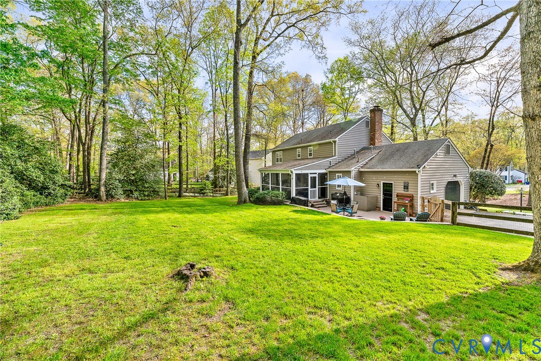 1013 Castle Hollow Road Midlothian, VA 23114 - Photo 41 of 45 Back of property with a screened porch, a chimney,