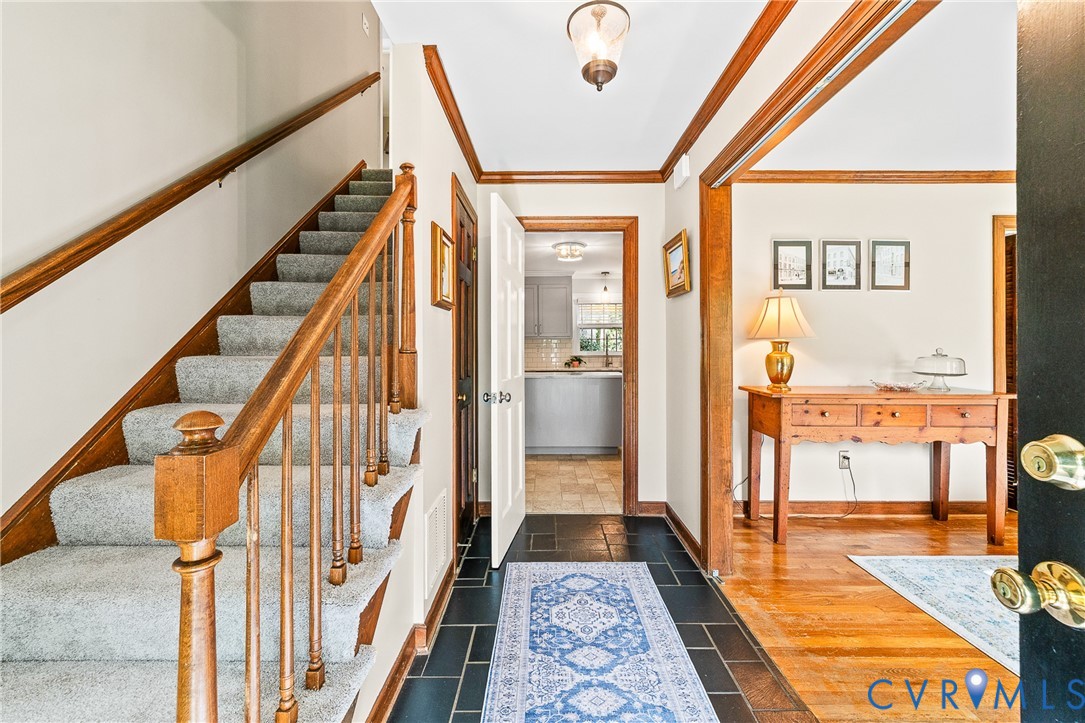 1013 Castle Hollow Road Midlothian, VA 23114 - Photo 8 of 45 Foyer featuring crown molding and dark wood-type f