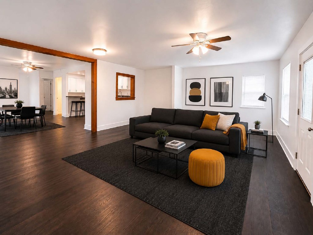 610 Gunter Street Austin, TX 78702 - Photo 4 of 16 Rich hardwood flooring anchors this open concept living space, perfect for entertaining.