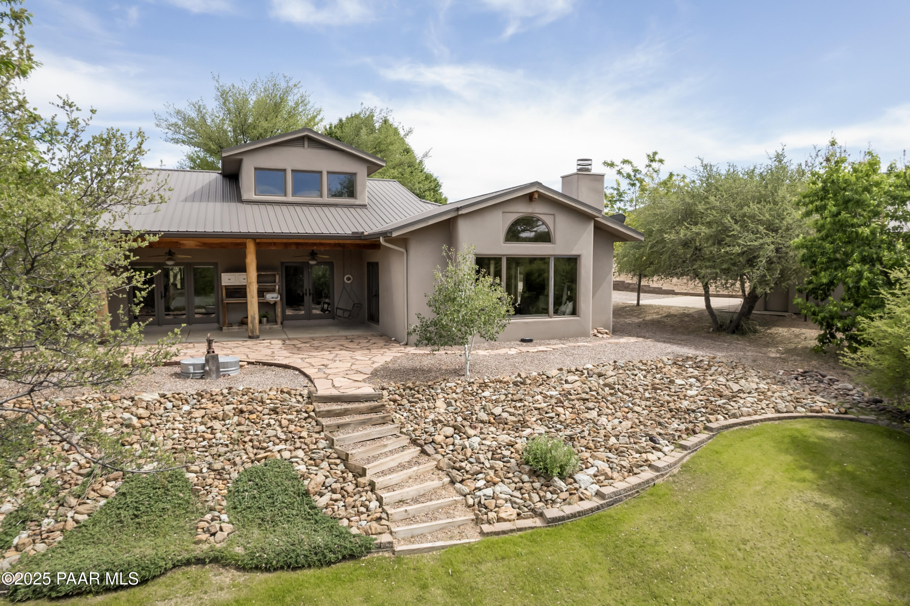 770 Grisby Road Skull Valley, AZ 86338 - Photo 37 of 58 a front view of a house with a yard
