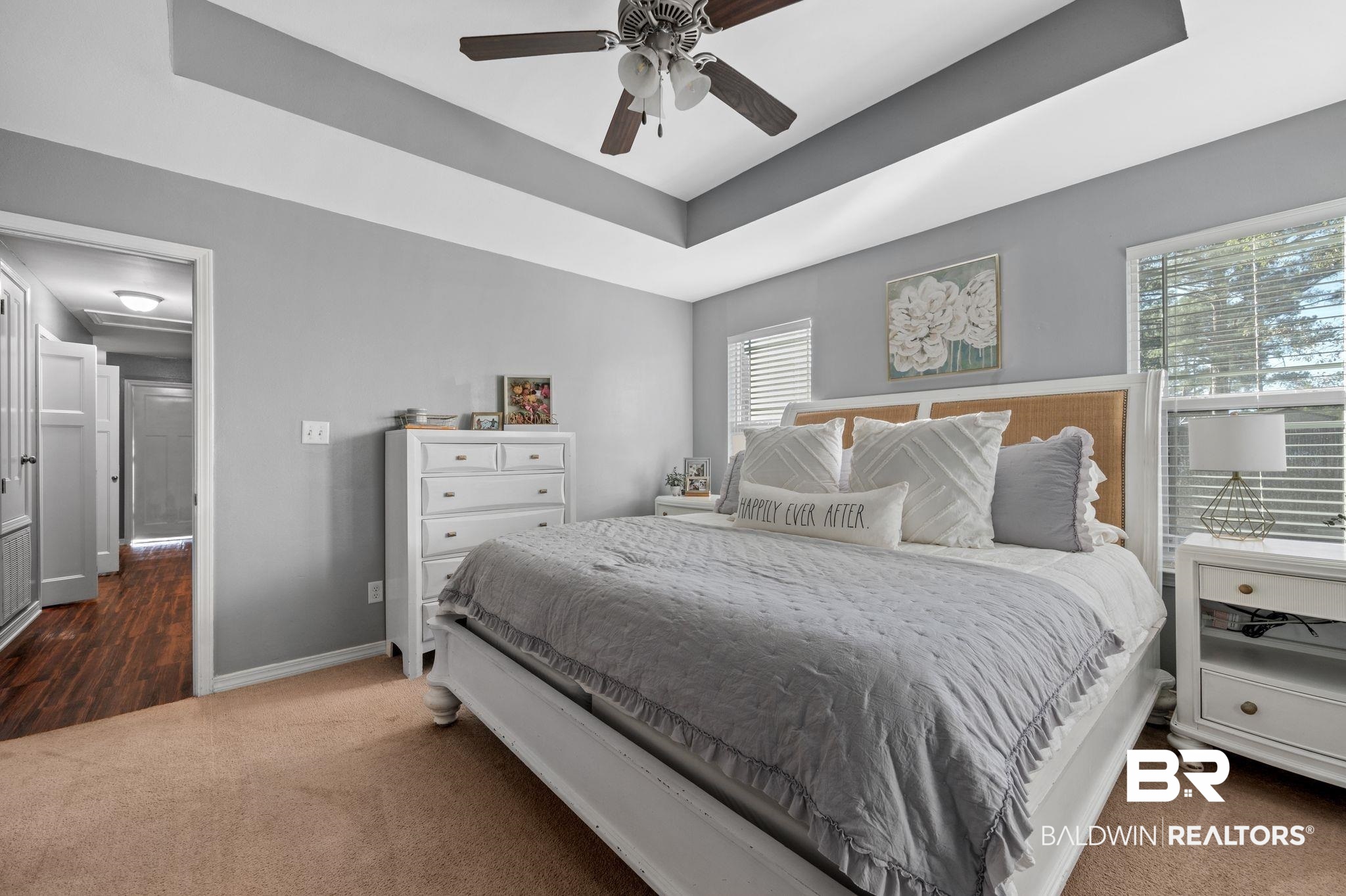 9366 Fox Run Court Semmes, AL 36575 - Photo 16 of 29 Carpeted bedroom featuring ceiling fan and a raised ceiling