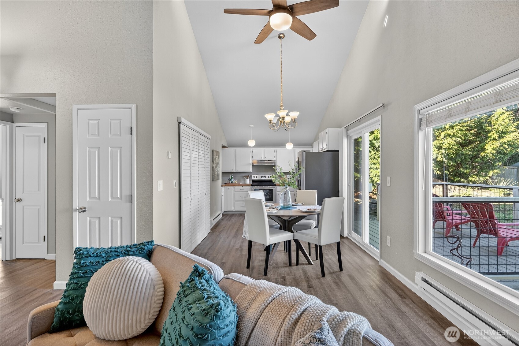 2422 McGregor Road Southeast Port Orchard, WA 98366 - Photo 13 of 32 a view of a livingroom with furniture window and wooden floor