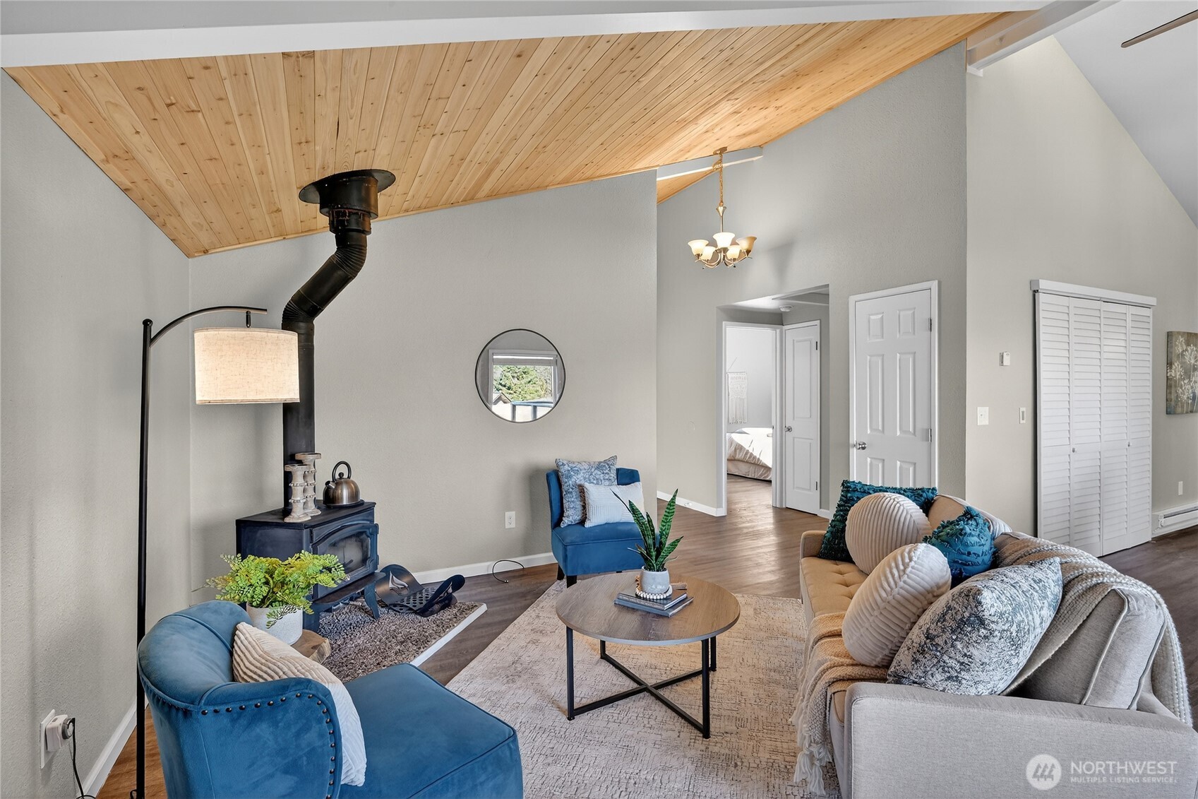 2422 McGregor Road Southeast Port Orchard, WA 98366 - Photo 18 of 32 a living room with furniture and wooden floor