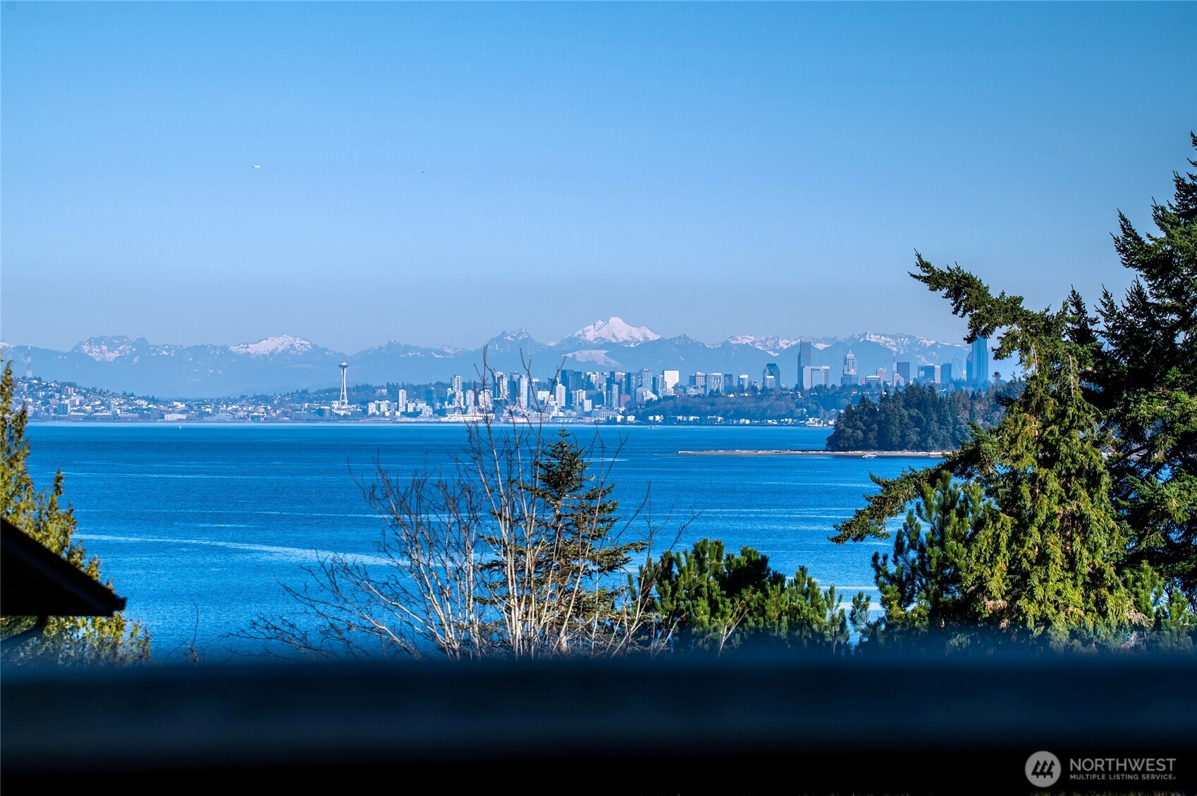 2422 McGregor Road Southeast Port Orchard, WA 98366 - Photo 32 of 32 a view of a city with lots of residential buildings ocean and mountain view in back