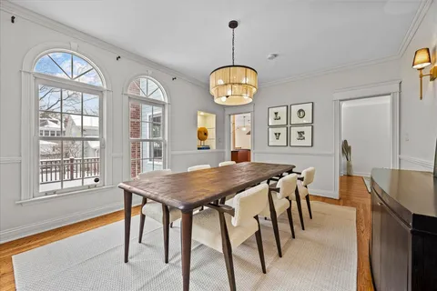 a large kitchen with stainless steel appliances granite countertop a stove and a sink
