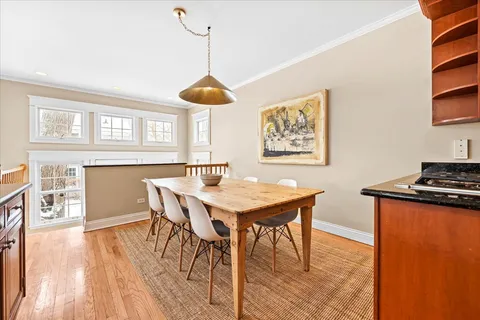 a kitchen with stainless steel appliances granite countertop a refrigerator stove and sink