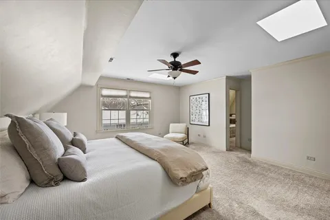 a bathroom with a tub a sink and a shower