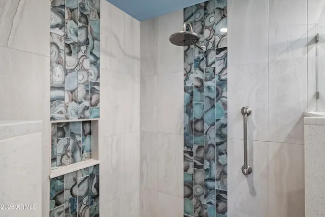 a bathroom with a sink mirror vanity and toilet