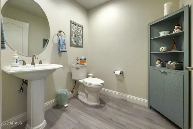 a close view of a sink a mirror and shower in a bathroom