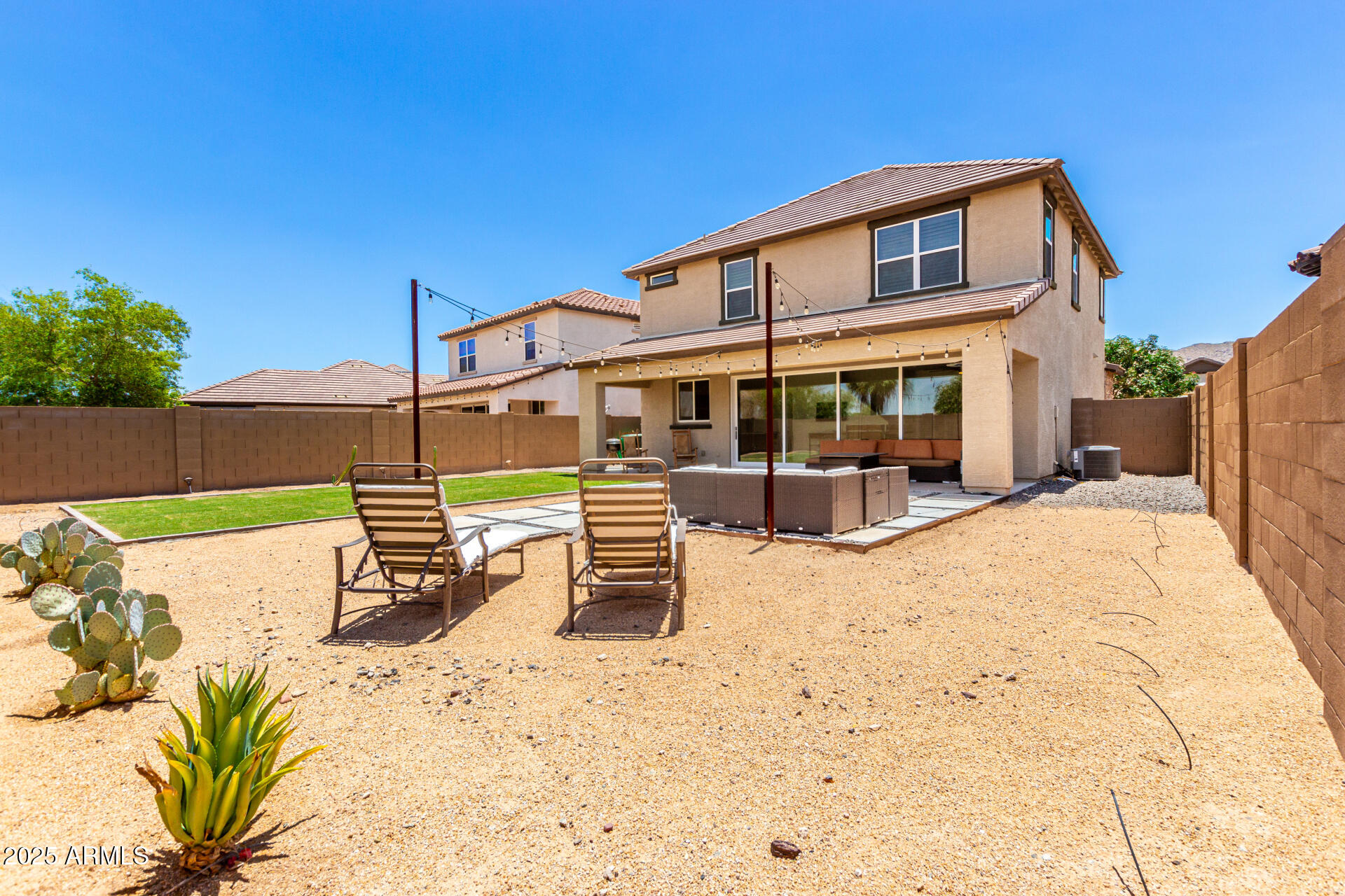 820 Constance Way Phoenix, AZ 85042 - Photo 19 of 29 a view of a house with a yard