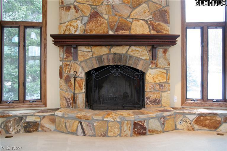 3535 Shade Road Akron, OH 44333 - Photo 4 of 25 Marvelous stone fireplace with sitting ledge.