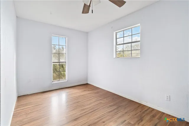 an empty room with windows