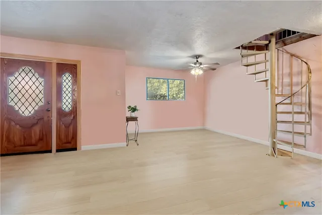 an empty room with windows