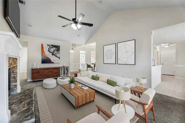 a dining room with furniture and wooden floor