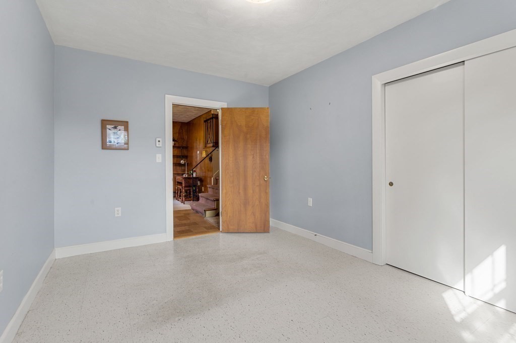 7 Hawthorn Road Marblehead, MA 01945 - Photo 15 of 24 a view of an empty room with closet and a window
