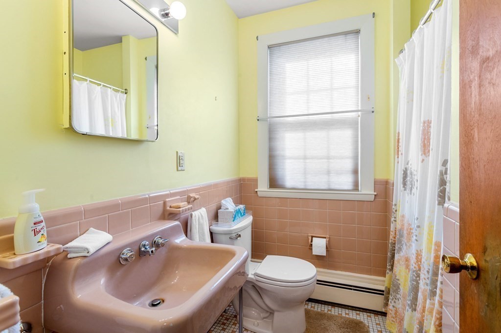 7 Hawthorn Road Marblehead, MA 01945 - Photo 17 of 24 a bathroom with a sink a toilet and a mirror