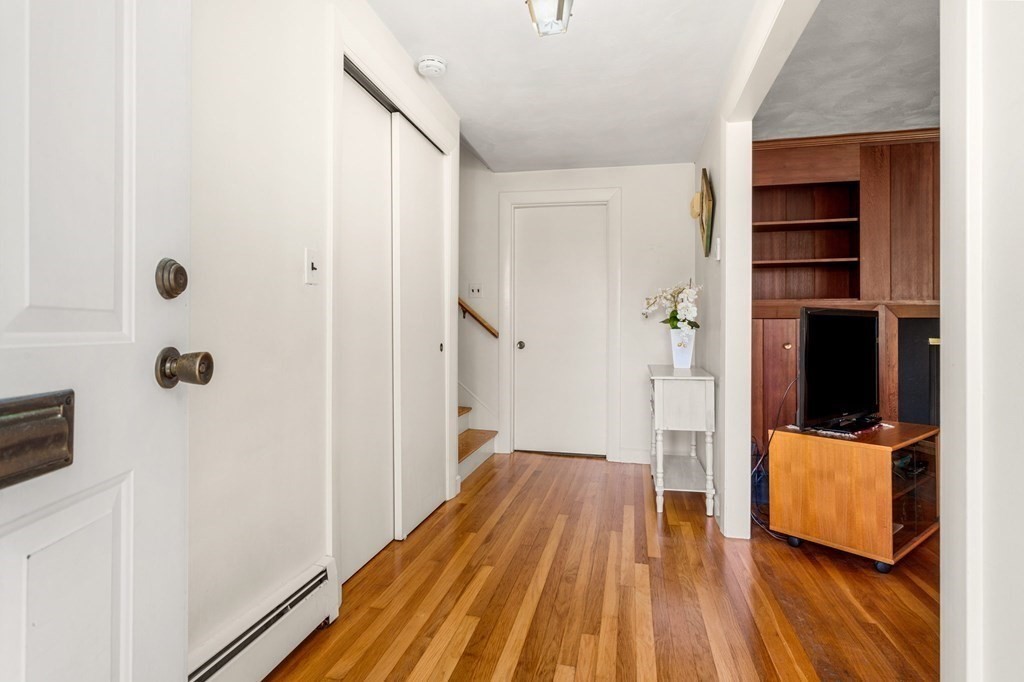 7 Hawthorn Road Marblehead, MA 01945 - Photo 9 of 24 a view of a bedroom with wooden floor and closet