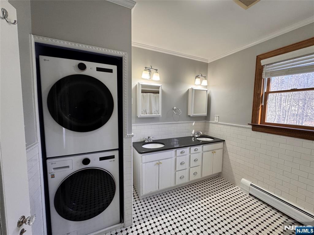 232 Franklin Turnpike Allendale, NJ 07401 - Photo 25 of 33 a kitchen with a sink a stove top oven and cabinets
