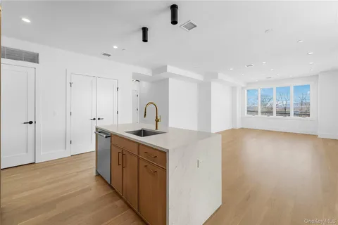 a kitchen with a sink and a window