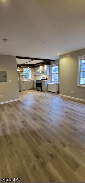37 Delaware Avenue, Unit 2 Bloomfield, NJ 07003 - Photo 5 of 9 a view of a livingroom with an empty space and a window