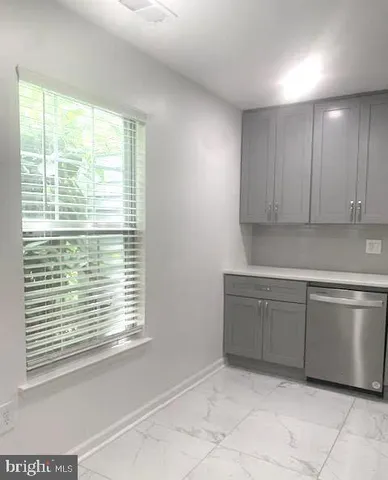 a bathroom with a toilet a sink and a bathtub