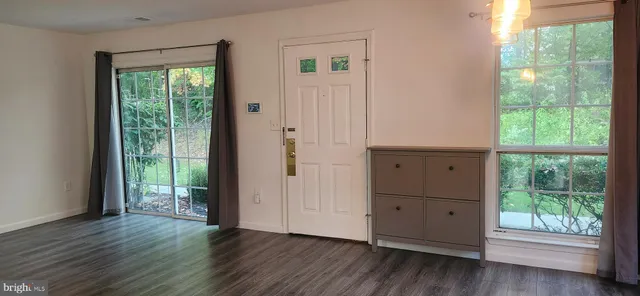 a bathroom with a shower and a bath tub