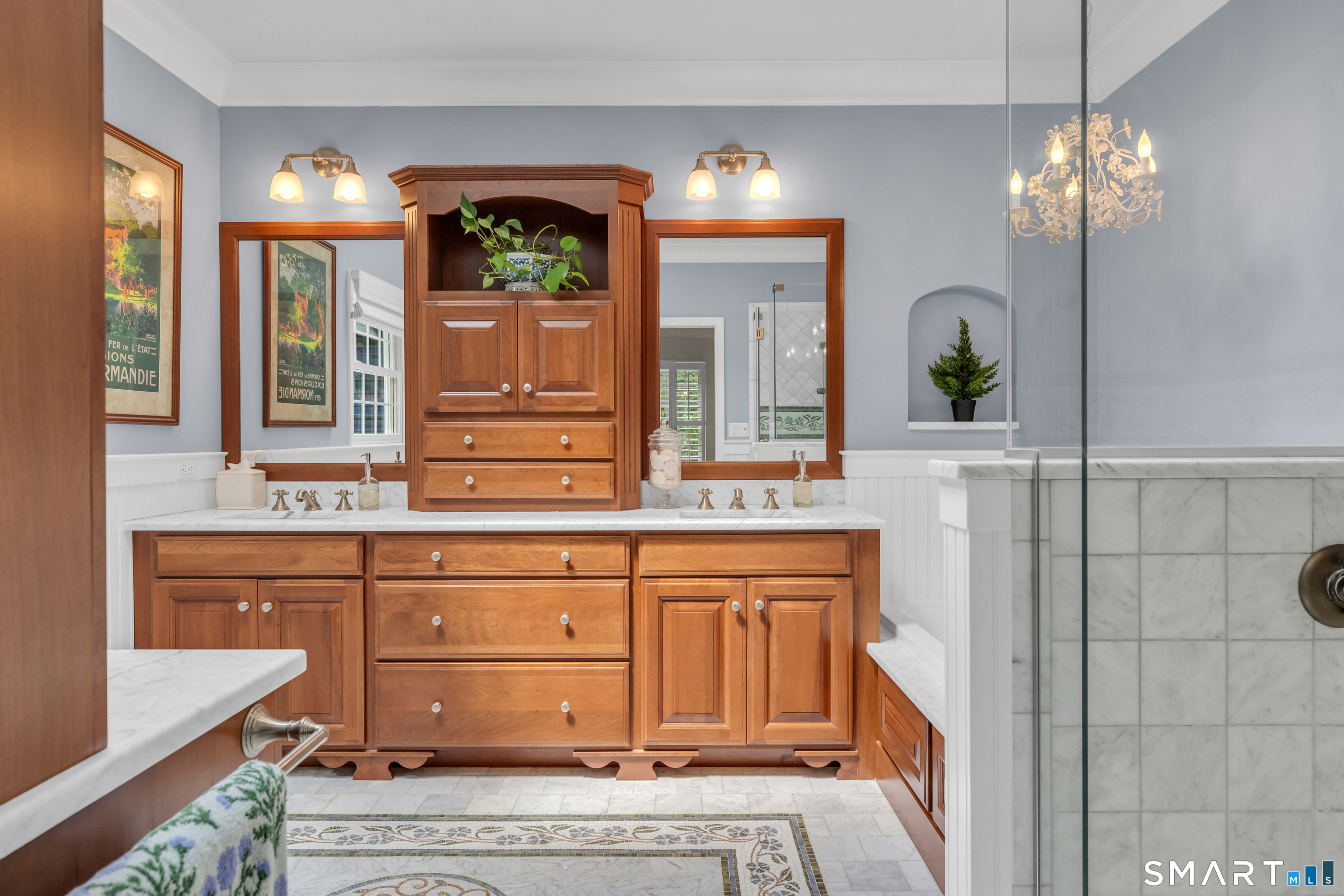 46 Laurel Cliffs Road Guilford, CT 06437 - Photo 18 of 40 The Primary Bath has a custom shower, a deep, single soaking tub, Easy to feel pampered with marble finishes, mosaic tiles, crown molding, and chandelier.