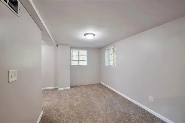 an empty room with windows