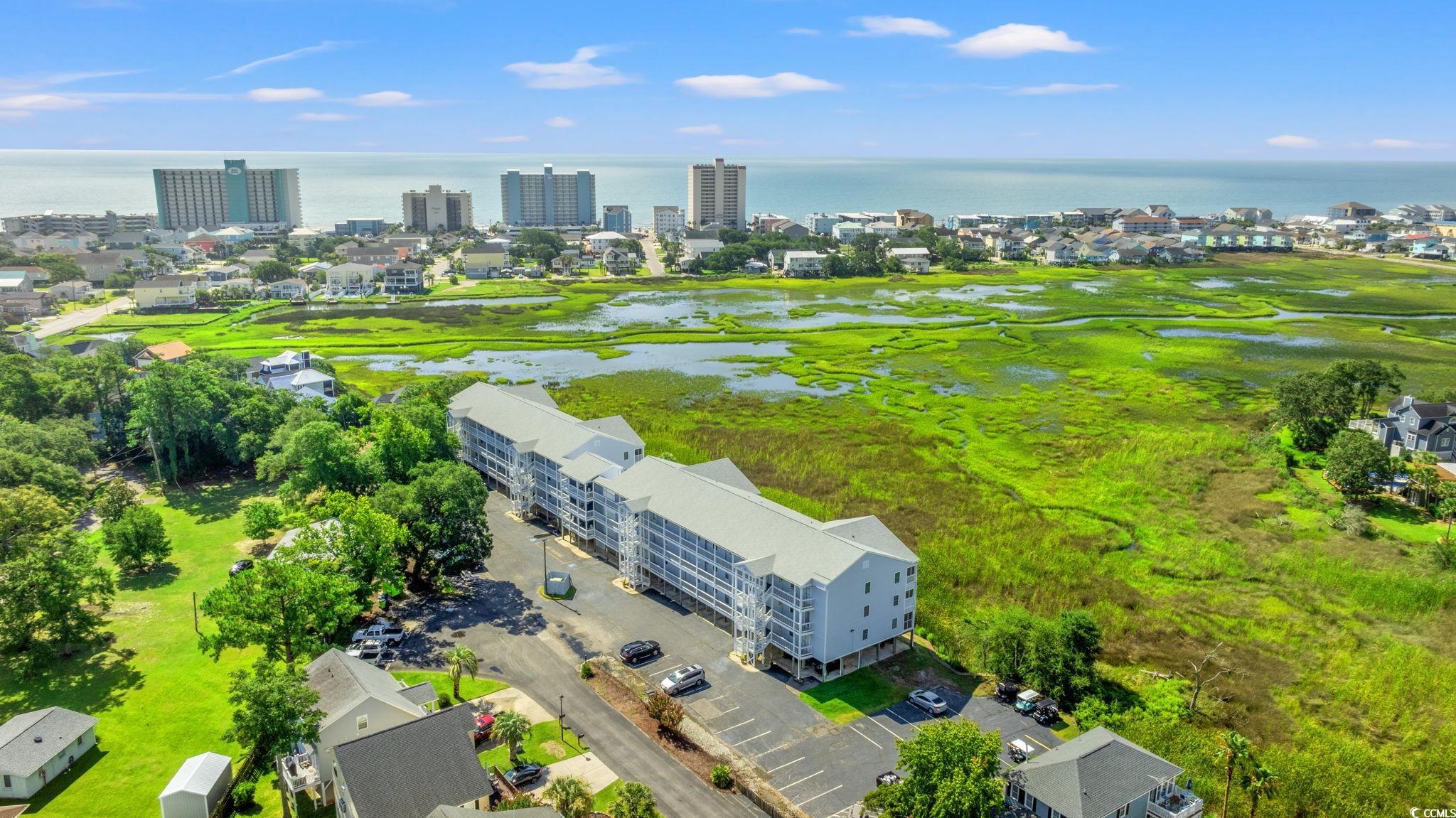 300 Marsh Place, Unit 204A Murrells Inlet, SC 29576 - Photo 1 of 39 Bird's eye view of a nearby body of water and apartment complex