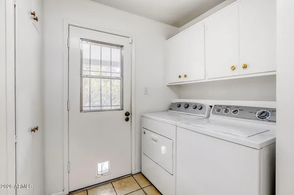 a bathroom with a bathtub a toilet and a shower