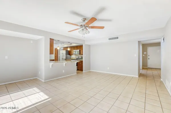a view of a kitchen with a sink and a stove top oven