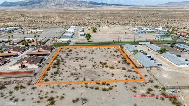 an aerial view of beach and ocean