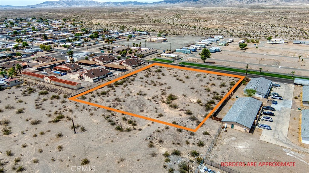 0 Coronado Street Needles, CA 92363 - Photo 6 of 22 an aerial view of beach and residential houses