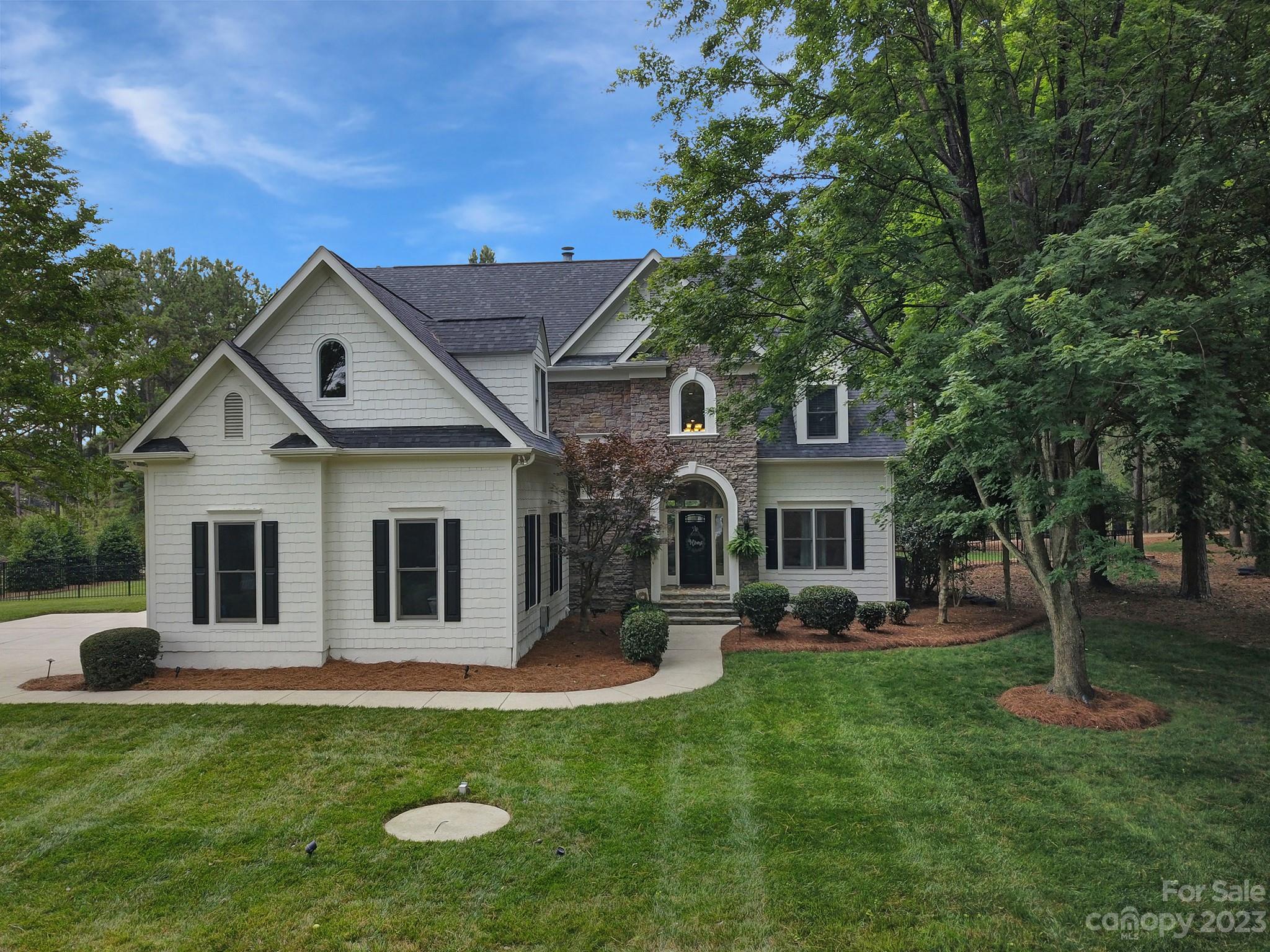 112 Old Post Road Mooresville, NC 28117 - Photo 1 of 42 a front view of house with yard and green space